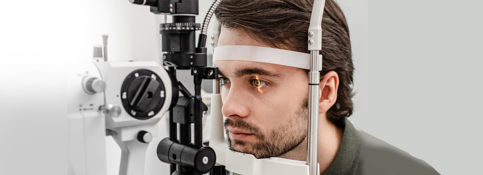 young man during eye exam in Central West End